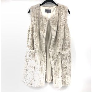 Boho boutique cream faux fur vest.  Size L Lined